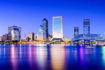 Jacksonville’s downtown skyline reflected in the St. Johns River at night